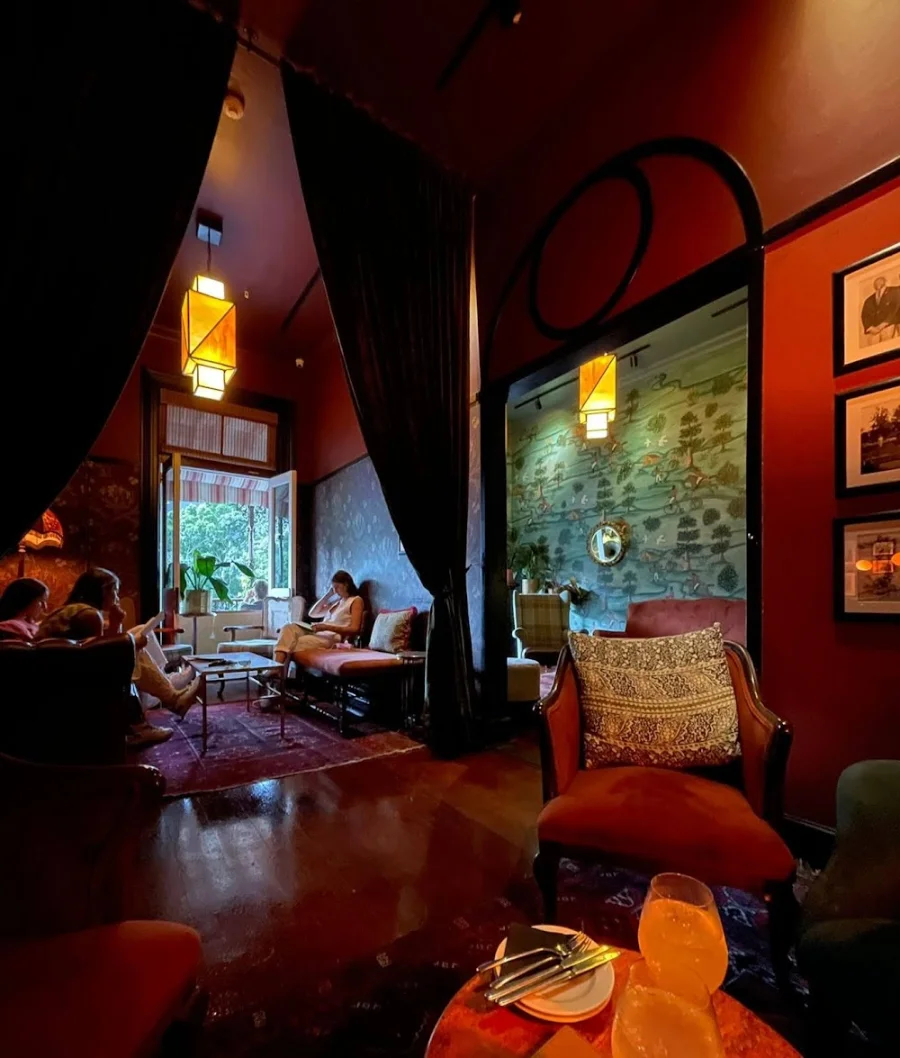Bar side — mural glimpsed through the arch — Athletic Club & Social, Gardens, Cape Town