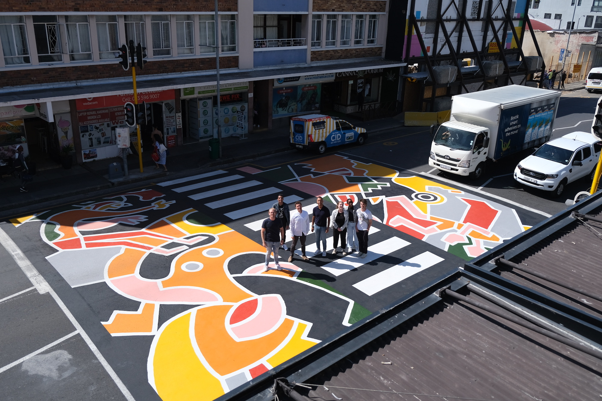 Sea Point Crossing — hand-painted mural by Cape Town Mural Arts, Main Road, Sea Point, Cape Town