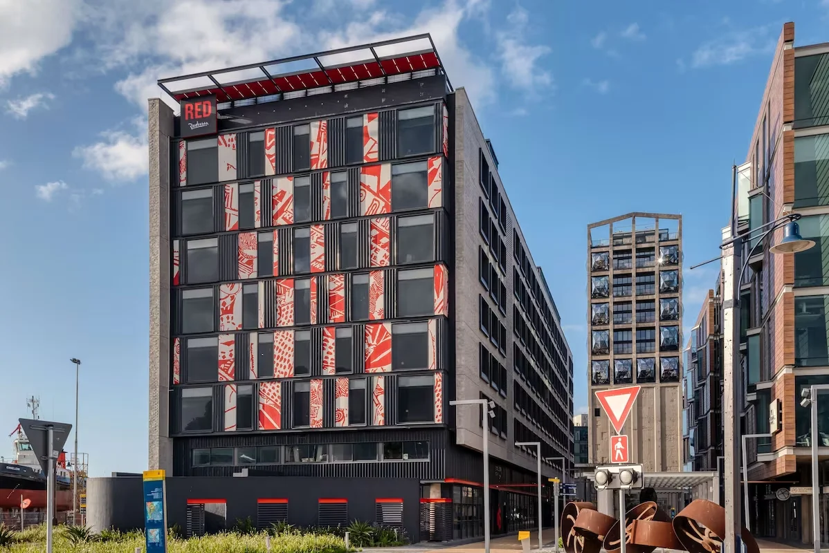 Radisson Red — hand-painted mural by Cape Town Mural Arts, Silo District, V&A Waterfront, Cape Town