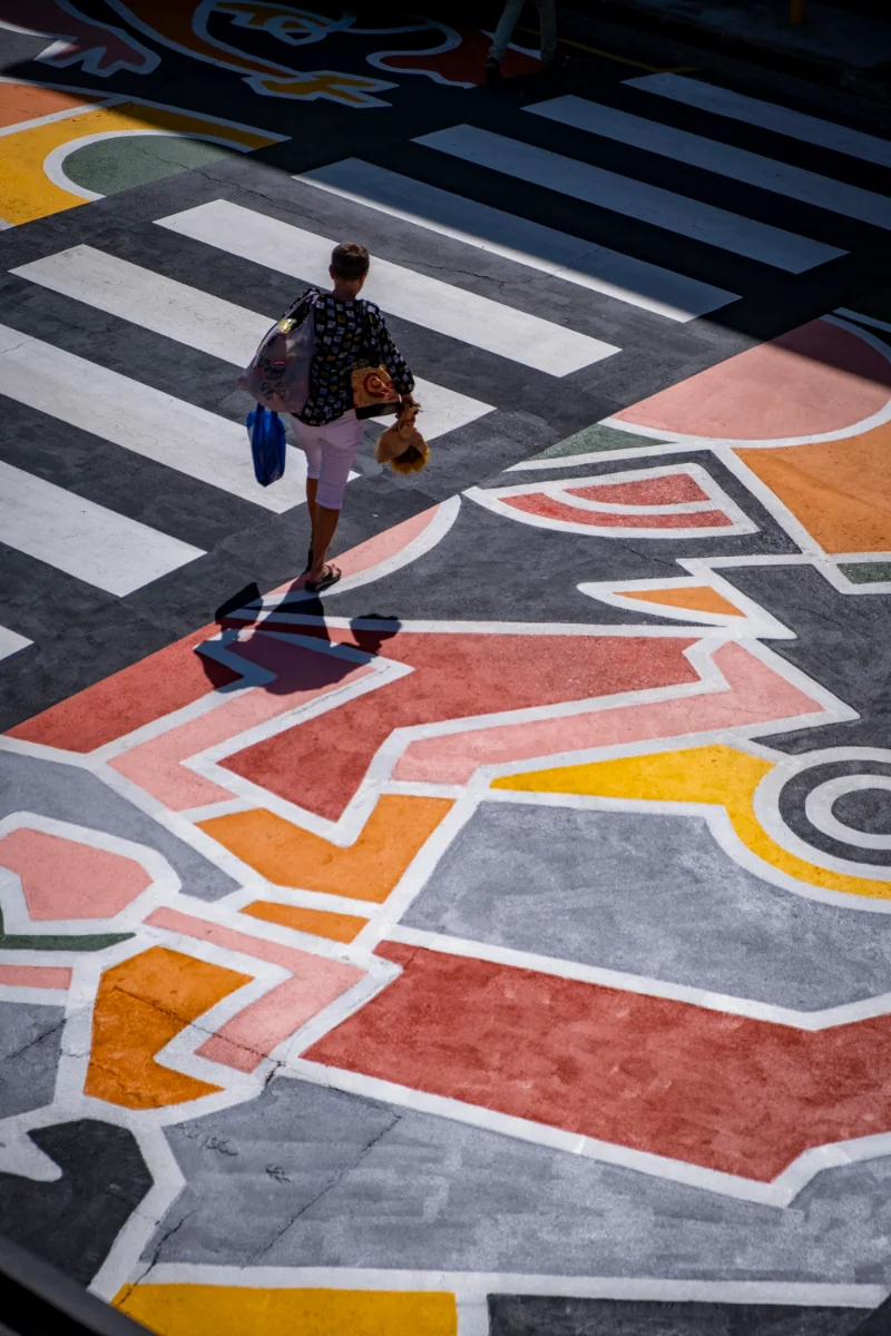 Sea Point Crossing — hand-painted public art mural, Sea Point, Cape Town